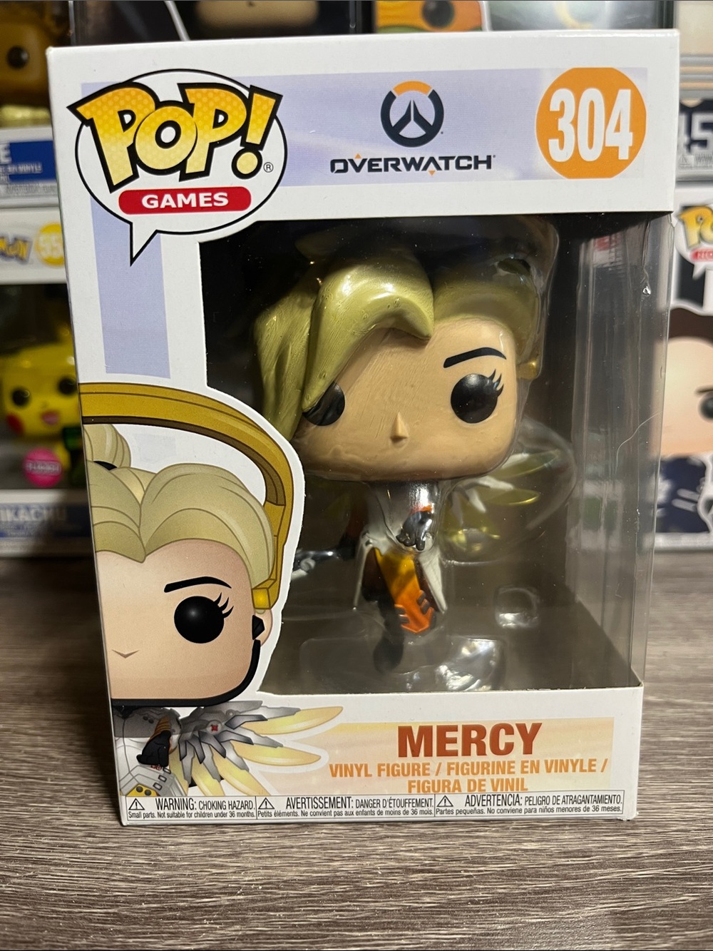 Funko Overwatch Mercy Vinyl Figure - Gold, White & Orange